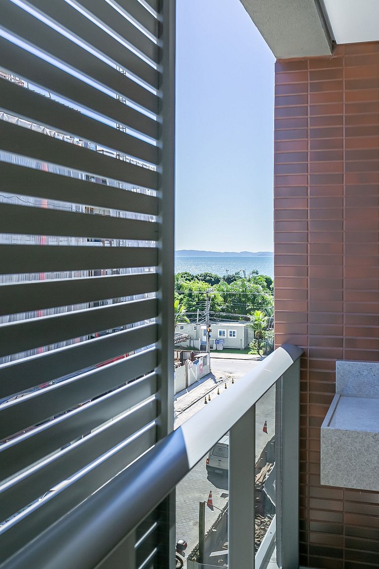 Partial SEA view from the balcony in Jurerê #JA24D