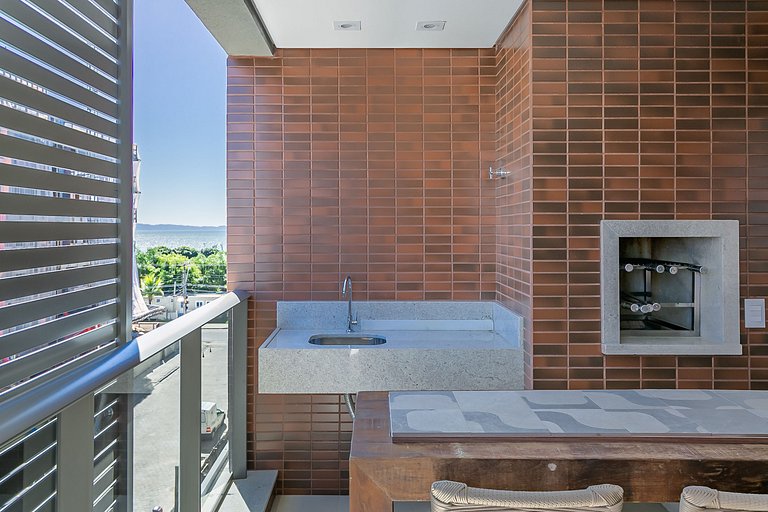 Partial SEA view from the balcony in Jurerê #JA24D